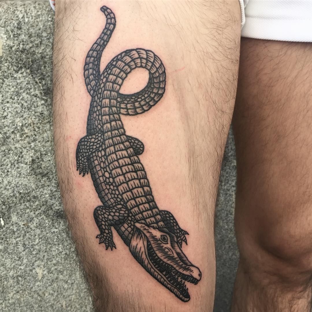 Crocodile tattoo on the thigh for men