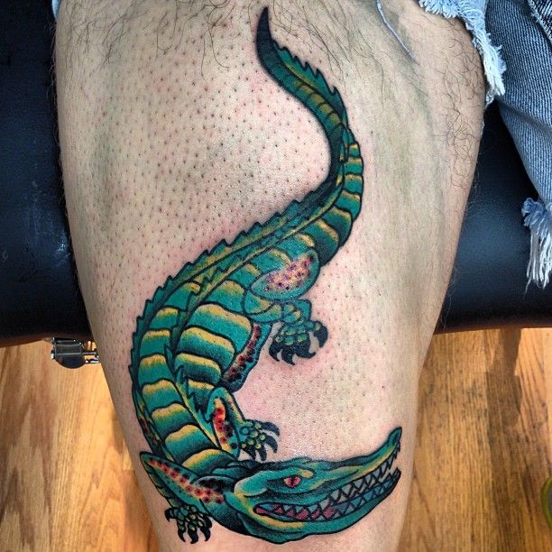 Crocodile tattoo on the thigh for men