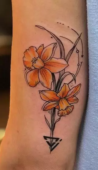 Daffodil flower tattoo on the shoulder for men