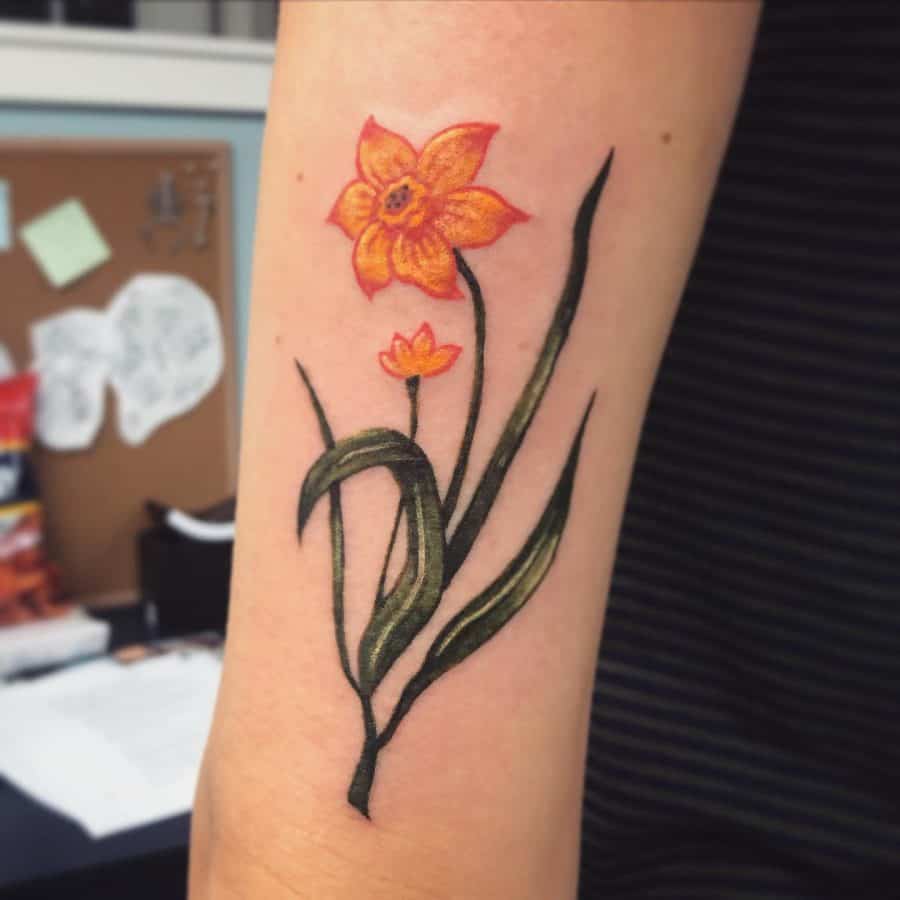 Narcissus flower tattoo on the shoulder for men