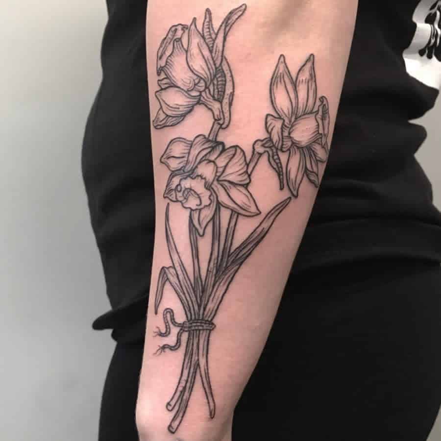 Daffodil flower tattoo on the forearm for men