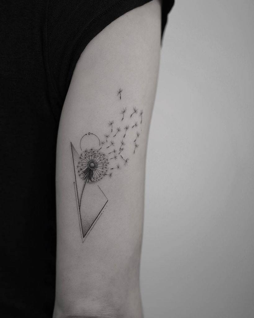 Dandelion tattoo on the shoulder for men