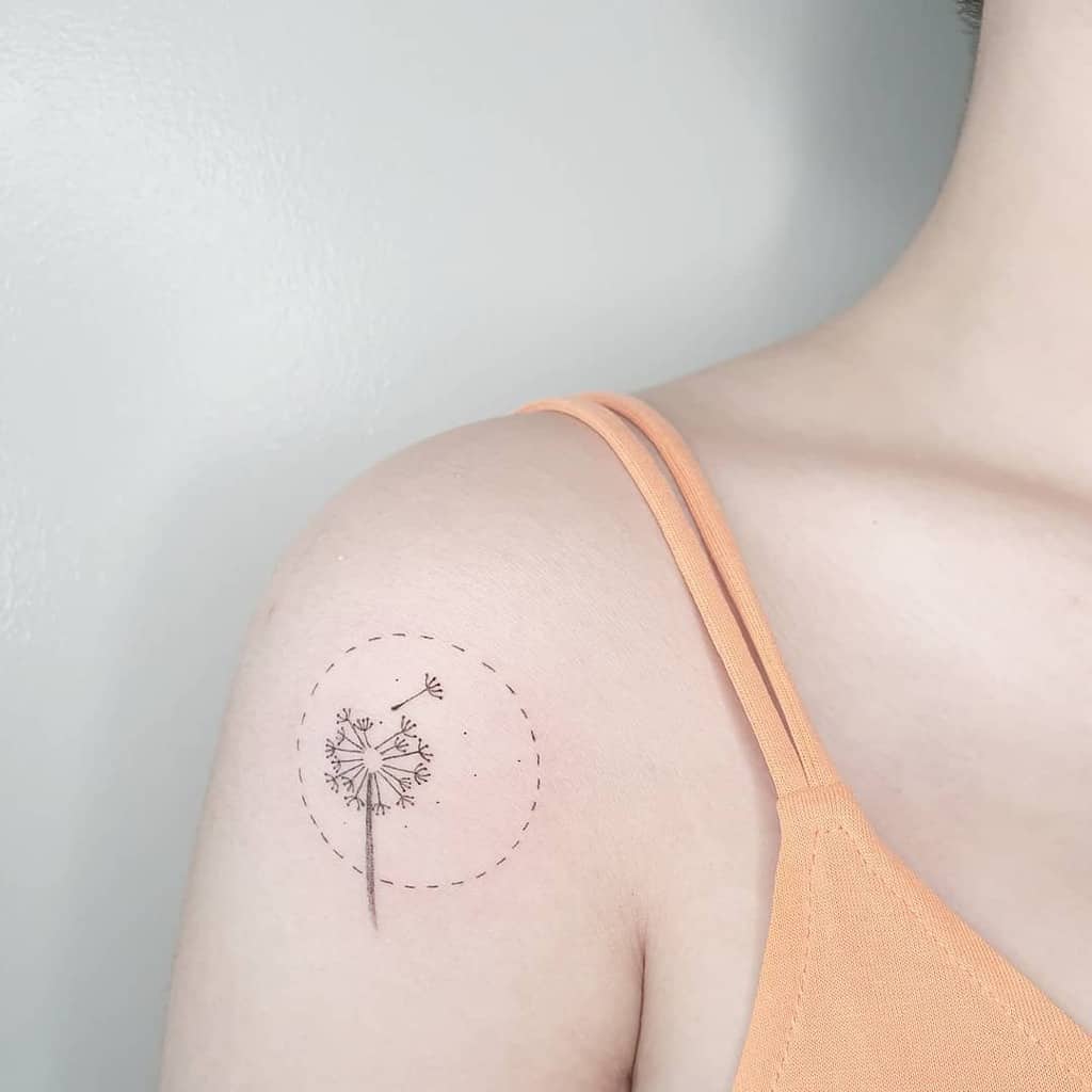 Dandelion tattoo on the shoulder for women