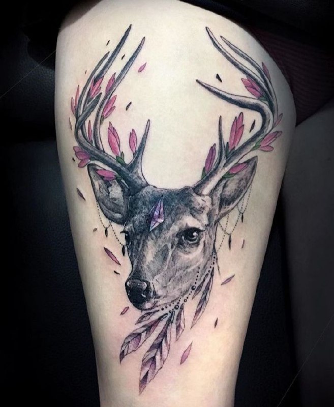 Tattoo of a deer on the hip for women