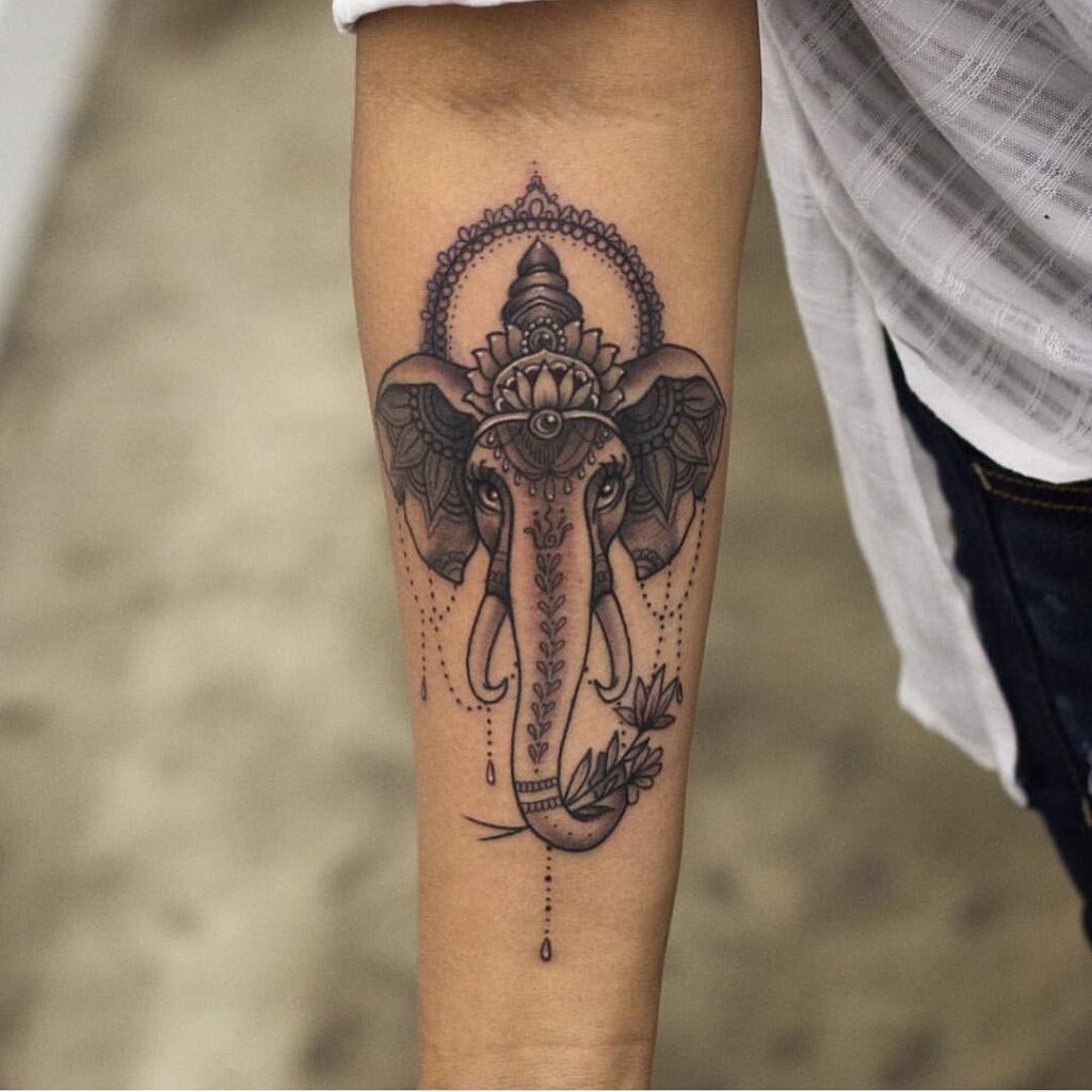 Elephant tattoo on the forearm for women