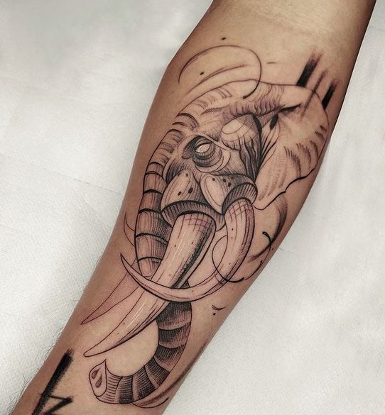 Elephant tattoo on the forearm for men