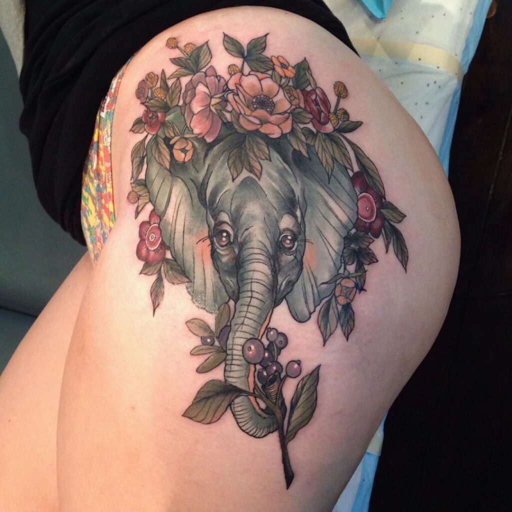 Elephant tattoo on the hip for women