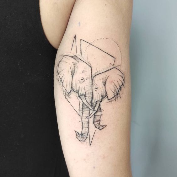 Elephant tattoo on the shoulder for women