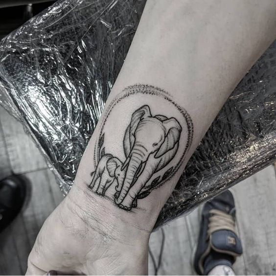 Elephant tattoo on the wrist for women