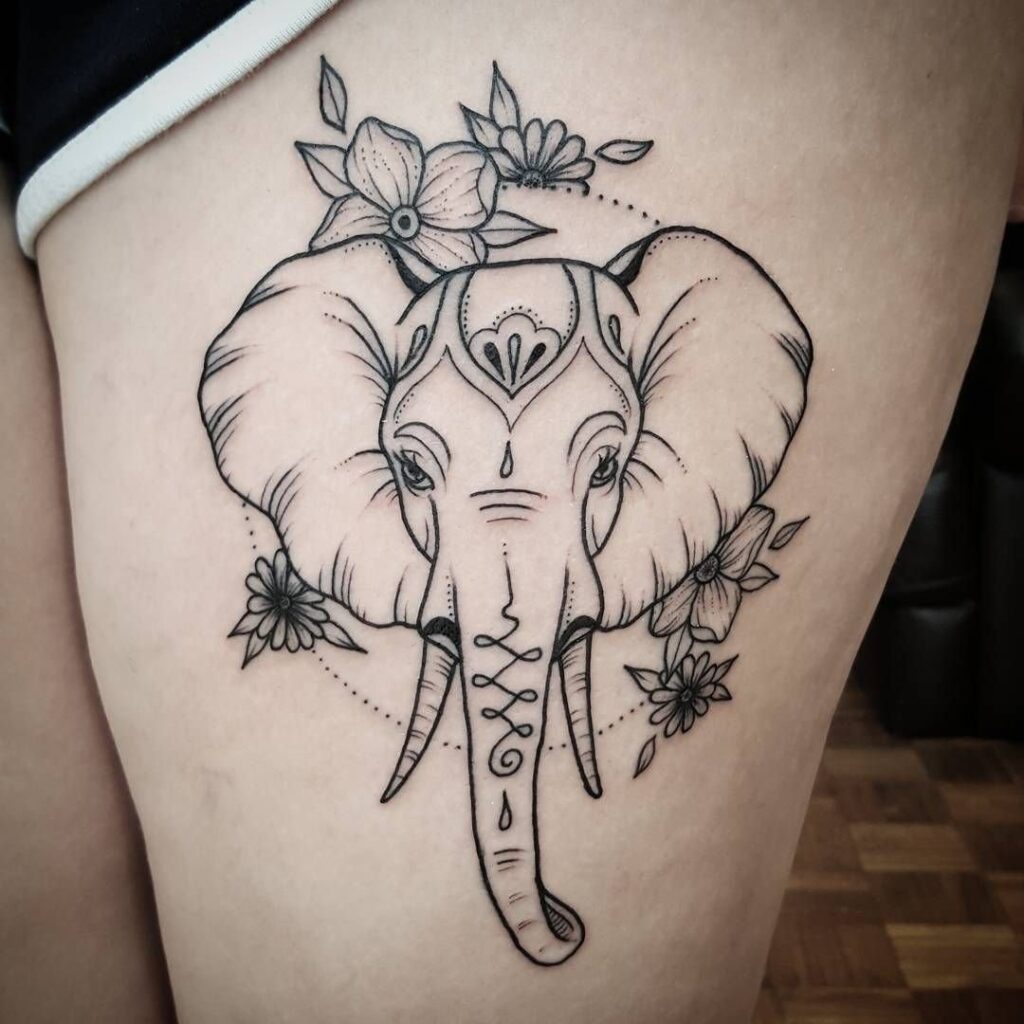 Elephant tattoo on the hip for women