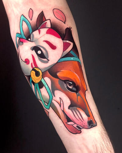 Tattoo of a fox with a mask on the forearm for women