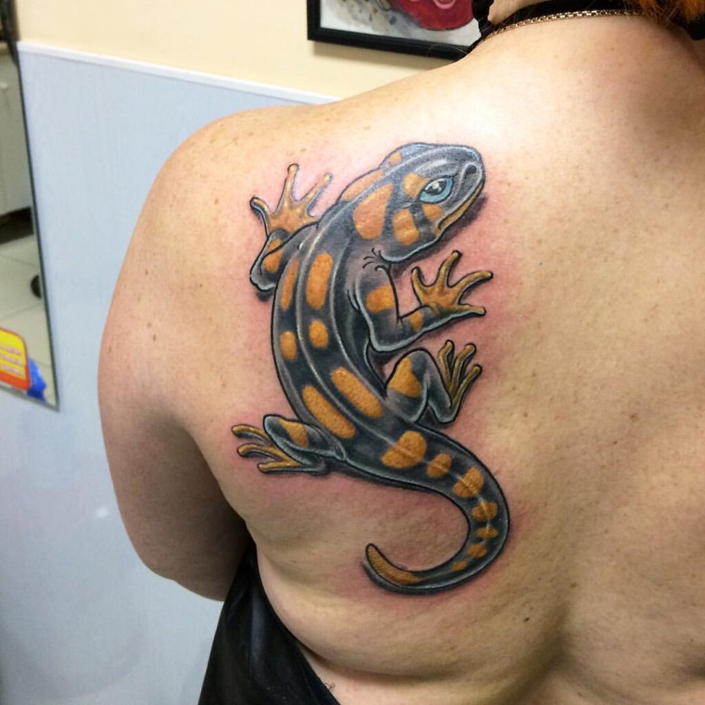 Salamander tattoo on the shoulder blade for men