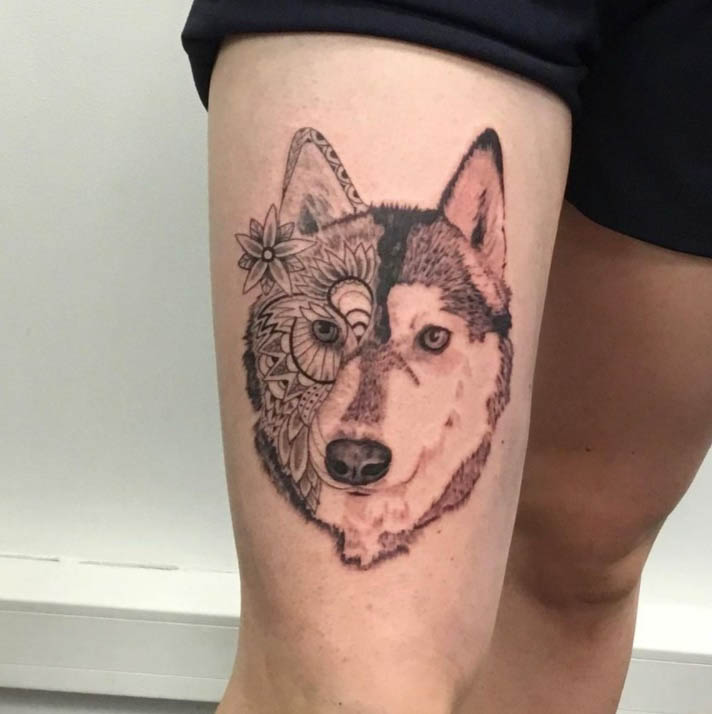 Husky tattoo on the hip for women