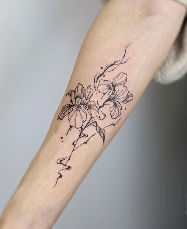 Iris tattoo on the forearm for men