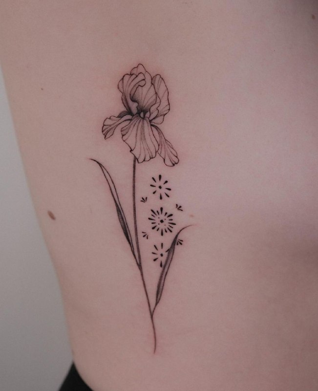 Iris tattoo on the side for women