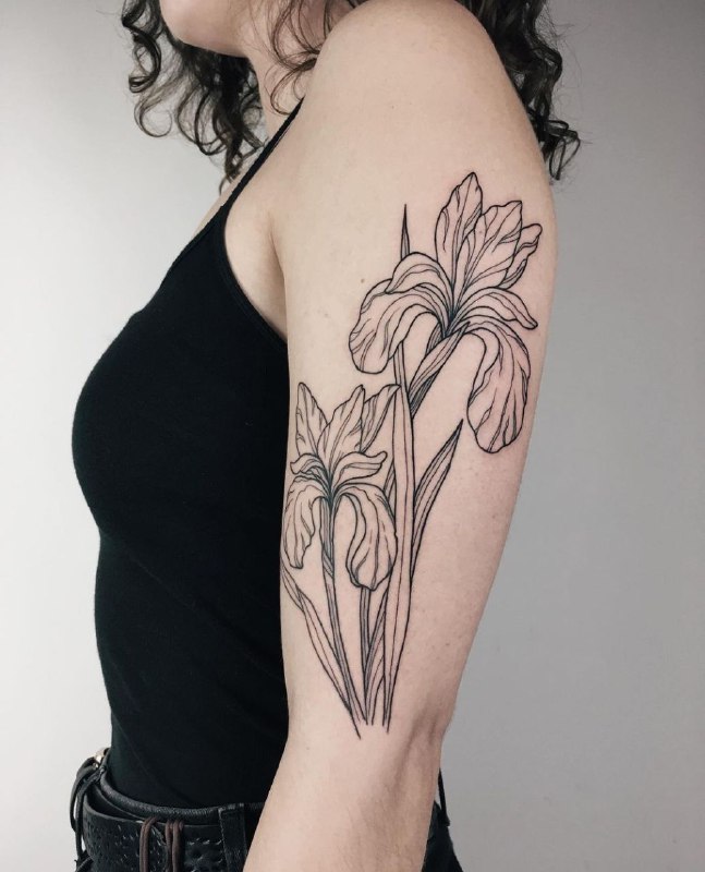 Iris tattoo on the shoulder for women