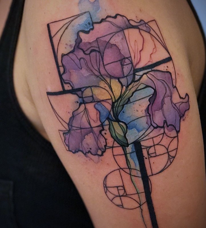 Color iris tattoo on the shoulder for men