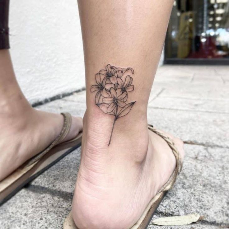 Jasmine tattoo on the ankle for women