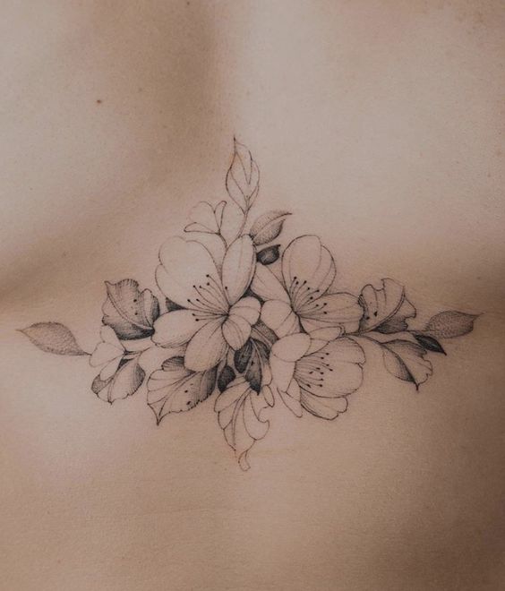 Jasmine tattoo on the chest for women