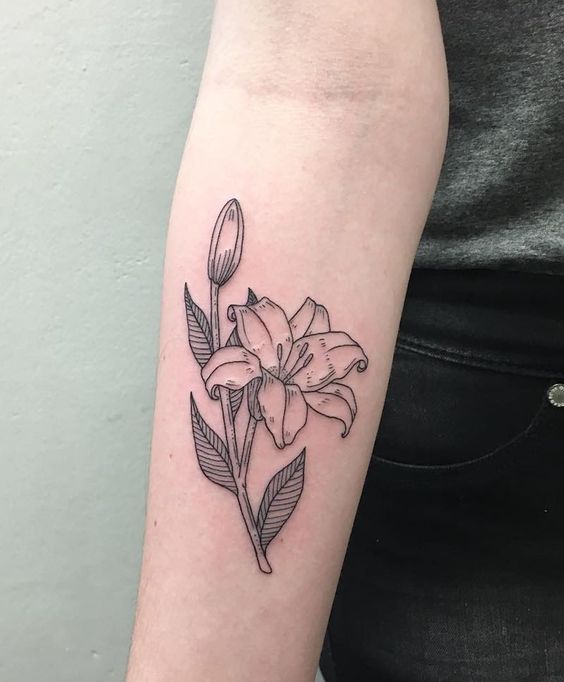 Lily tattoo on forearm for women