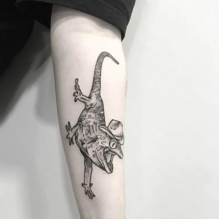 Lizard tattoo on the forearm for men