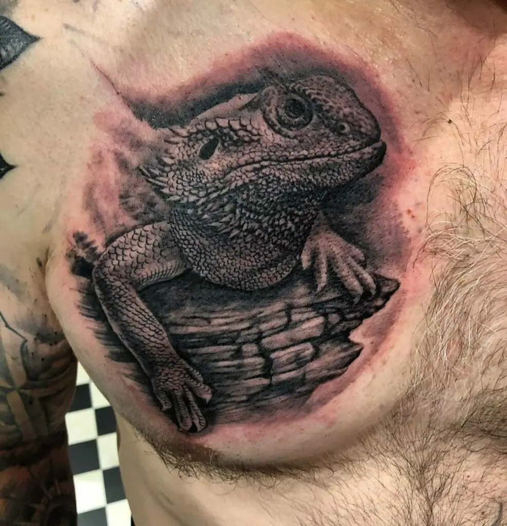 Lizard tattoo on the chest for men