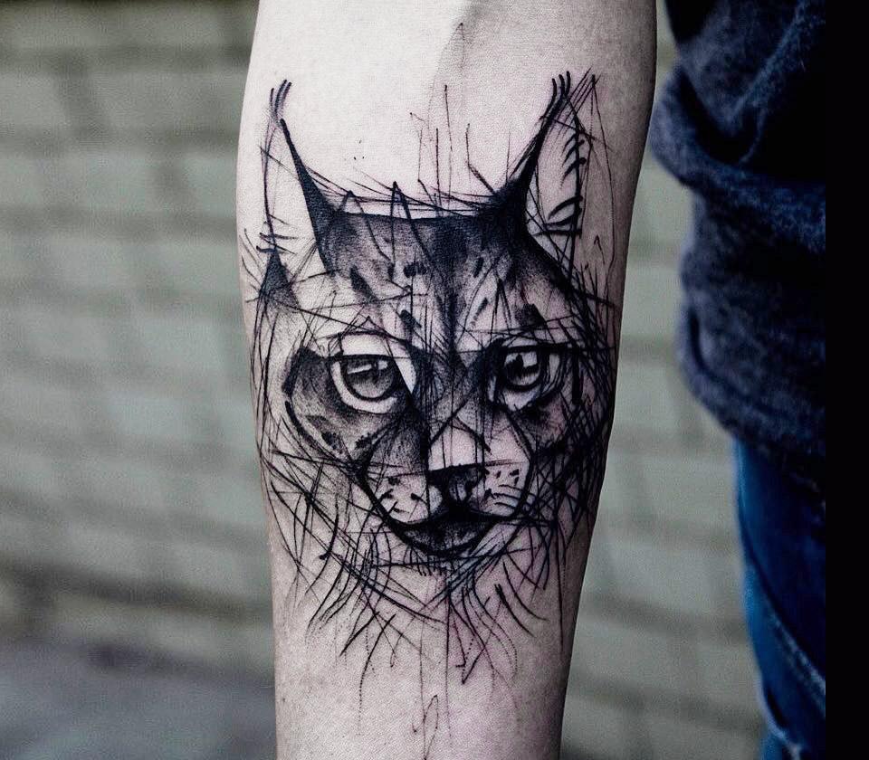 Lynx tattoo on the forearm for men