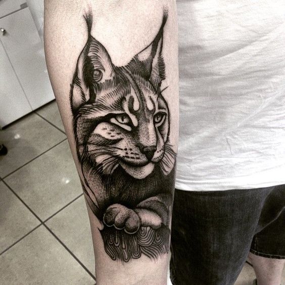 Lynx tattoo on the forearm for men