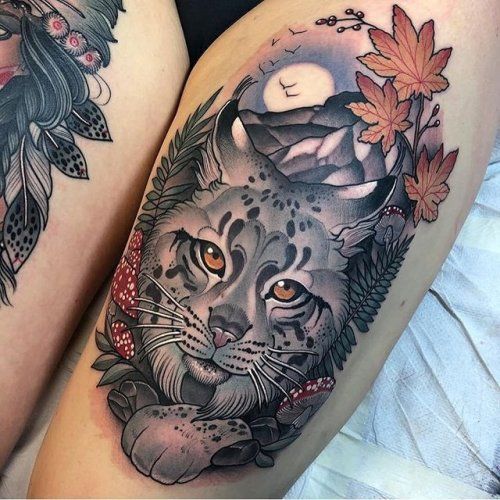 Tattoo of a lynx on the hip for women