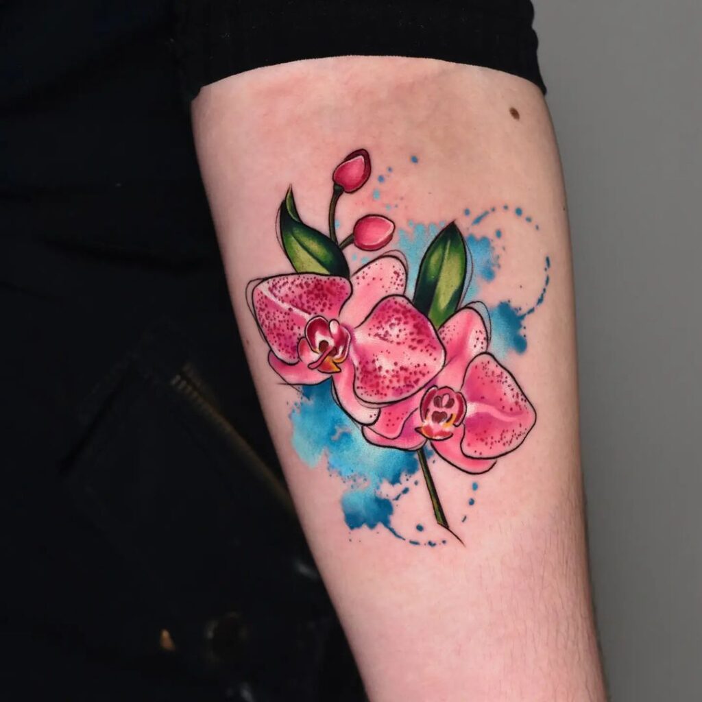 Color orchid tattoo on forearm for women