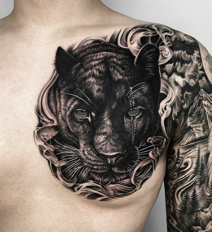 Panther tattoo on the chest for men