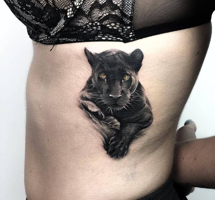 Panther tattoo on the side for women