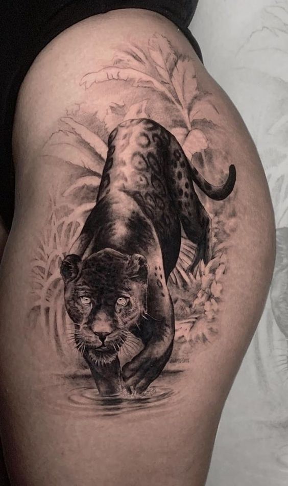 Panther tattoo on the hip for women