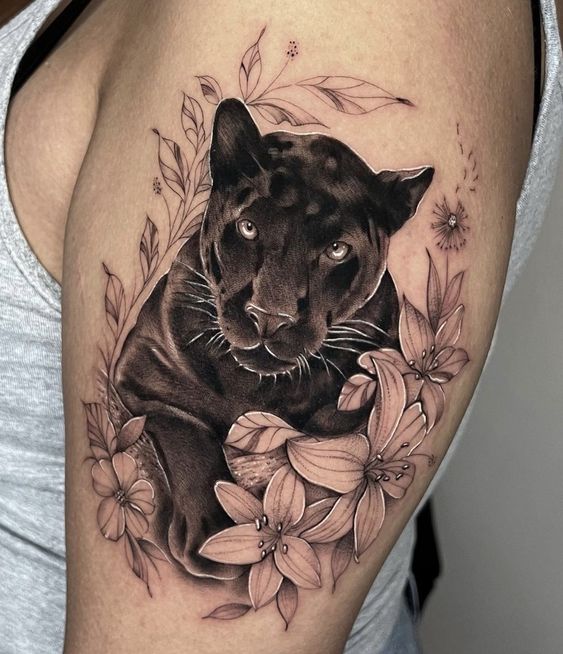 Tattoo of a panther on the shoulder for women