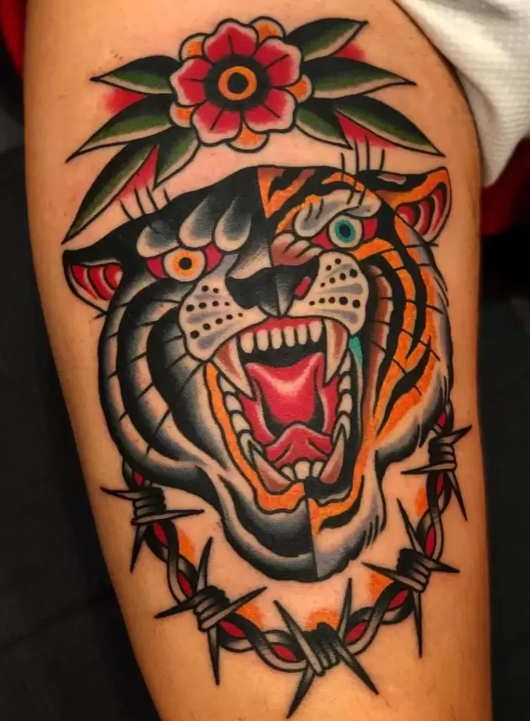 Colored panther tattoo on the thigh for women