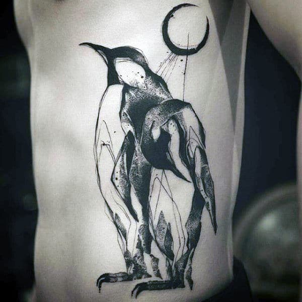 Tattoo of a penguin on the side for men