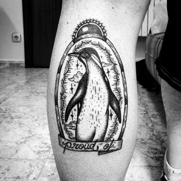 Tattoo of a penguin on a calf for men