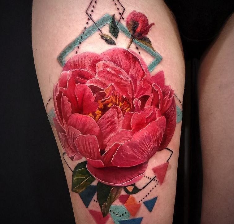 Color peony tattoo on the hip for women