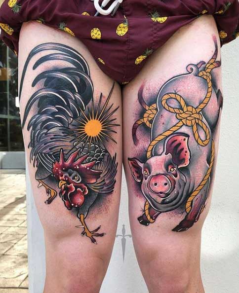 Pig tattoo on the thigh for women