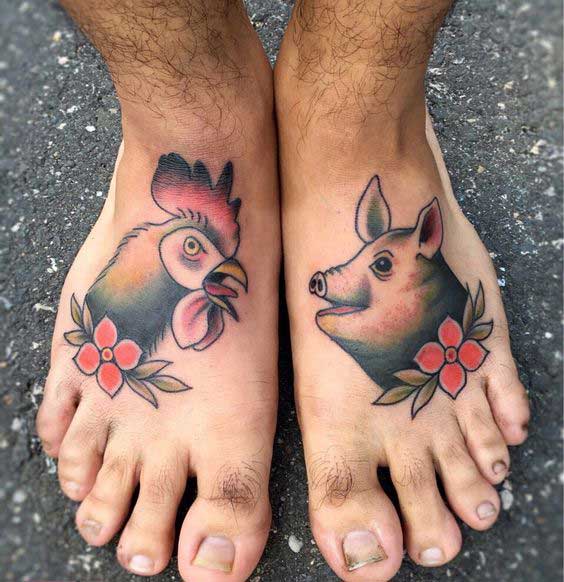 Tattoo of a pig on the ankle for men