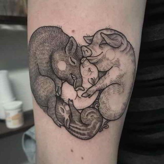 Pig tattoo on the forearm for women