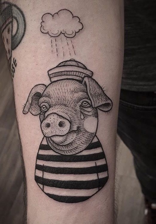 Pig tattoo on the forearm for men