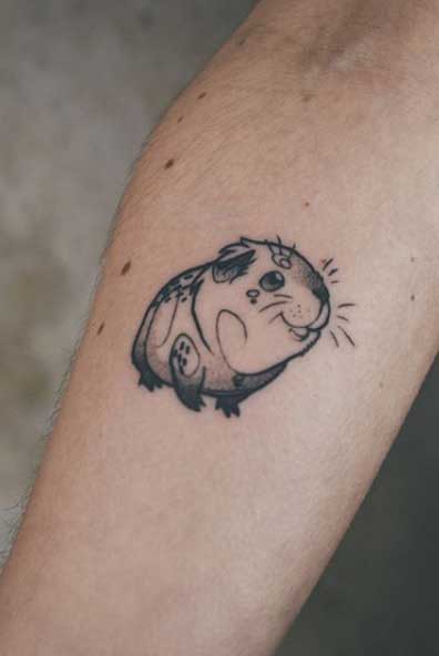 Guinea pig tattoo on the forearm for men