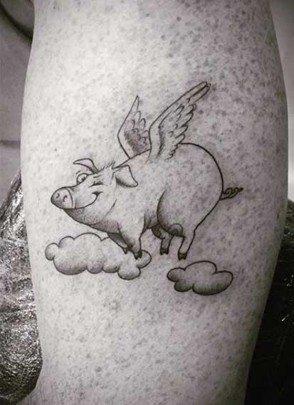 Pig tattoo on the arm