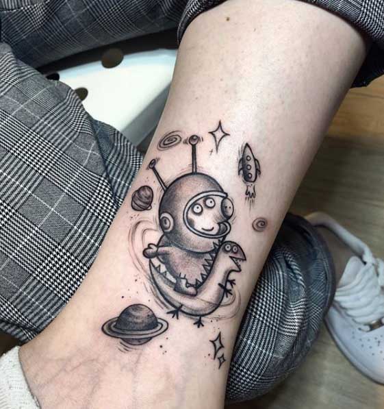 Peppa pig tattoo on the shin for men