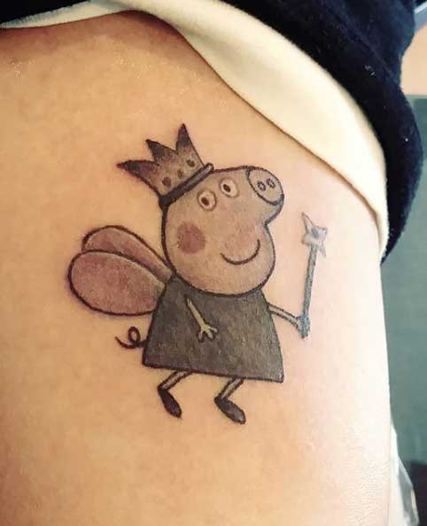 Peppa pig tattoo on the side for women