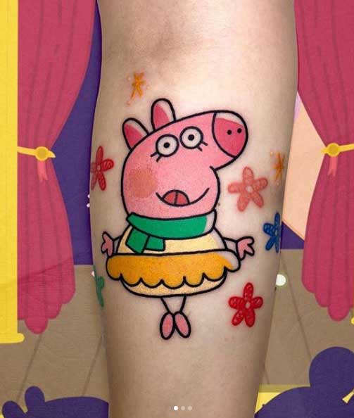 Peppa pig tattoo on the shin for women