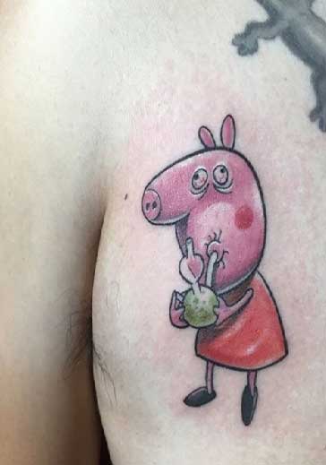 Peppa pig tattoo on the chest for men