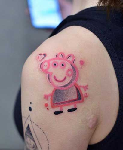 Peppa pig tattoo on the shoulder for women