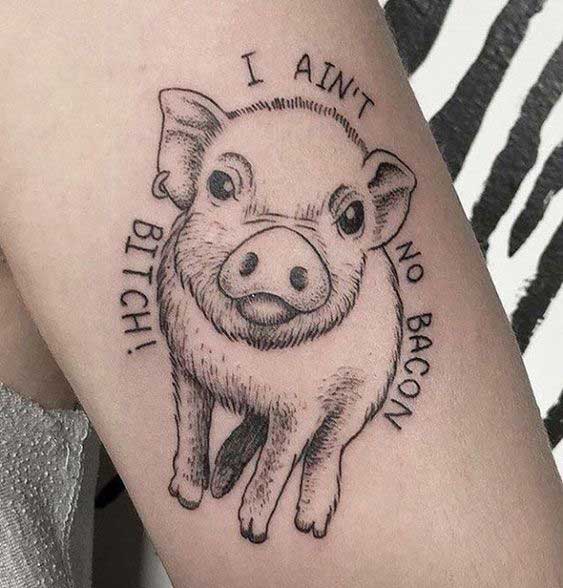 Pig tattoo on the leg